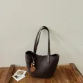 Dark brown woven shoulder bag, vintage faux suede bucket bag with stylish hanging charm. - Coffee