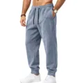 Close up detail of men casual sweatpants with elastic waist and drawstring in grey blue. - S / Bottoms / Light Blue