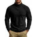 Close-up of men's black fleece mock neck sweatshirt featuring sleeve zipper pocket and details. - S / Tops / Black