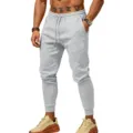 Pantaloni da jogging uomo tinta unita con comoda vita coulisse elastica e polsini. - Taglia S / Grigio chiaro