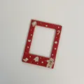 Detailed close-up of the red Christmas magnetic photo frame decorated with cute gingerbread. - Red Christmas Cookie / Small Size