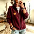 Women's full-zip fleece jacket with stand collar, casual cozy outerwear with pocket details. - S / Tops / Burgundy