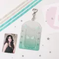 PVC photocard holder detail with ribbon bow, heart clasp, and star glitter decoration. - Bow Pendant / Green