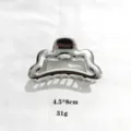 Silver metallic hair claw clip with unique wavy design, elegant hair accessory for women. 8cm - 8cm Size / Silver
