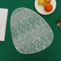 White hollow abstract PVC placemat leaf pattern table mat for modern dining room decor. - Egg-Shaped Crocodile Grain / Placemat / Silver