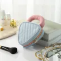 Cute blue cosmetic bag with pink handle and zipper, portable makeup storage bag for travel. - Soda Color-Block Small Blue