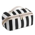 Black and white striped cosmetic bag with handle and zipper for travel and daily use. - Black & White Stripes