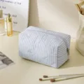 Blue and white striped quilted cosmetic bag, cute travel makeup storage pouch with zipper. - Octagon Style / Double Stripe