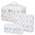 3-piece quilted cosmetic bag set with blue ribbon and floral pattern for travel storage. - Three-Piece Set / Blue Bow