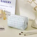 Blue and white plaid quilted cosmetic bag, cute zipper travel makeup pouch for daily use. - Octagon Style / Light Blue Plaid