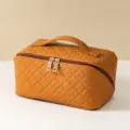 Quilted cosmetic bag in brown, large capacity portable makeup pouch for women and travel use. - Brown
