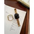 Glanzenend gouden roestvrijstalen horlogeband en bumperhoesje compatibel met Apple Watch. - 38 / Goud