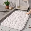 Detailed view of the white pebble pattern absorbent plush bathroom anti-slip floor mat surface texture. - 40*60cm / White