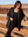 Outdoor western style black fringe jacket detail, vintage casual long sleeve coat scene. - S / Tops / Black