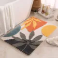 Alfombra de baño tuftada abstracta, felpudo antideslizante con diseño de plantas geométricas. - Flores de Cuatro Colores