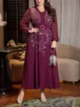Elegante plus size maxi jurk voor dames met lange mouwen en strass bloemendetails. - Bordeauxrood