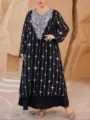 Abito lungo nero oversize elegante a maniche lunghe con raffinato ricamo in argento fine. - 0046