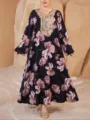 Dettaglio ravvicinato del maxi abito oversize con elegante ricamo dorato sullo scollo. - 0049