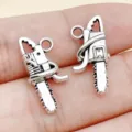 Vintage silver chainsaw charm pendant alloy DIY jewelry making keychain accessories. - Chainsaw (15483)
