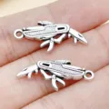 Silver metal multi-tool pendant charms for DIY jewelry making, keychains, and bracelets. - Multi-function Knife (15891)