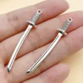 Antique silver alloy sword pendant DIY jewelry charm accessory for handmade necklace bracelet. - 1 Piece/Pack (56x9mm)