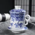 Blau-weisses Porzellan Teetasse Set mit Deckel und Untertasse bluemchen Schmetterling - 401-500ml / Keramik Vierteilige Tasse (Schmetterling Liebt Blume)