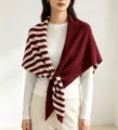 Cozy knit triangular scarf featuring a stylish two-tone striped and solid maroon design. - Striped Double Patchwork Shawl / Angola Red