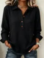 Women's solid waffle knit long sleeve polo top with button-up neckline and casual loose fit. - Black