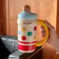 Large capacity insulated water bottle with cute colorful polka dot design and sturdy handle. - 600mL / Blue Polka Dot Lid (316 Stainless Steel Liner)
