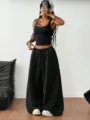 Conjunto casual de dos piezas para mujer top corto ajustado y pantalón ancho urbano. - XS / Top y Pantalones / Negro