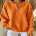 Jersey de punto acanalado para mujer con media cremallera y elegantes mangas largas. - S / Naranja