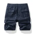 Men's dark blue cargo shorts with multiple pockets, casual elastic waist utility design. - 30 / Navy Blue