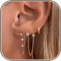 Close-up detail of multi-piece layered zirconia chain stud earrings and small gold hoop set. - Style 5 (3-Piece Set) / Gold