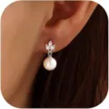 Elegant pearl drop earrings featuring sparkling cubic zirconia and shimmering white pearls. - Style 9