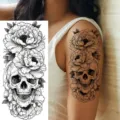 Temporary tattoo sticker featuring gothic skull and peony flower design for arm and leg use. - NZ544 Pattern