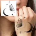 Temporary tattoo sticker with butterfly and crescent moon design, for hand body art. - HA022 / 8x8cm