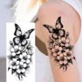 Waterproof temporary tattoo sticker featuring elegant butterfly and floral black design for arm. - Butterfly Floral Pattern (NZ516)