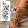 Waterproof temporary tattoo sticker featuring elegant black roses and flying butterflies for leg. - Butterfly Floral Pattern (NZ529)