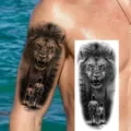 Waterproof temporary lion tattoo sticker for arm and leg, realistic body art design. - Lion Child Forest Style (NZ867)
