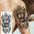 Waterproof temporary tattoo sticker featuring realistic lion and rose design for arm. - Roaring Lion Rose Style (NZ887)
