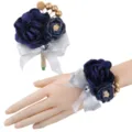 Details of dark blue artificial rose wrist corsage and boutonniere set with silver bow. - Boutonniere and Wrist Corsage Set / Navy Blue