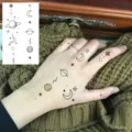 Tatuaggio temporaneo adesivo luna pianeta stella mano dito arte corporea chic - HS095