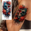 Temporary tattoo sticker with blue skull and red roses design for arm and leg. - NZ1189