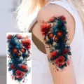 Temporary tattoo sticker featuring a dark skull and red roses design for arm or leg. - NZ1190