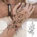 Water transfer temporary tattoo sticker featuring elegant black floral and butterfly designs. - HL107 / 12x8cm
