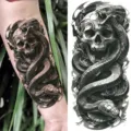 Waterproof temporary tattoo sticker featuring dark skull and snake design for arm use. - Skull Snake(NZ040)