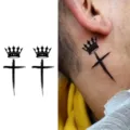 Temporary tattoo sticker featuring a stylish gothic crown and cross design for body art. - Crown Cross (HA114) / 8x8cm
