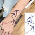 Water transfer temporary tattoo sticker featuring blue swallows design with red string variant. - Blue Swallow Style (FO036) / 15x7CM