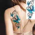 Blue butterfly temporary tattoo sticker with elegant vine lace design for back body art. - Blue-Green Butterfly Vine Style (FO043) / 15x7CM