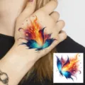 Temporary tattoo sticker featuring a vibrant flame butterfly design for hand and body art. - HA229 / 8x8cm